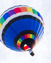 a colorful hot air balloon in flight 