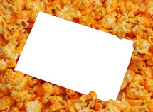 white sign on cheddar popcorn 