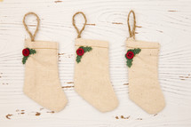 Christmas stockings on a white wood background 