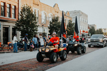 four wheelers in a parade 