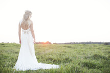 portrait of a bride standing outdoors 