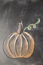 pumpkin on a chalkboard