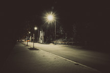 glowing street lights at night 