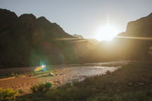 red rock peaks and river at sunrise 
