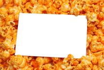 white sign on popcorn 