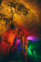 Colored cave and stalactites