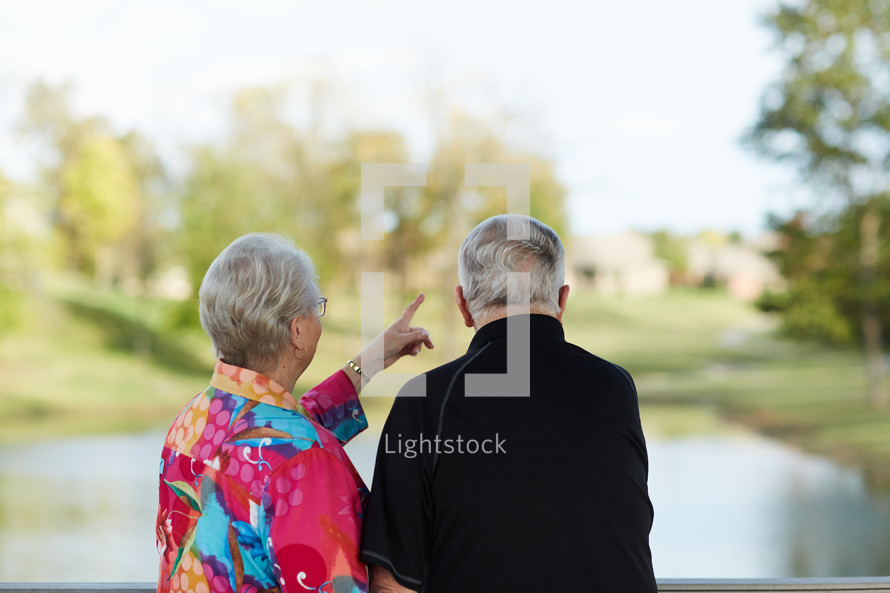 elderly couple standing together 
