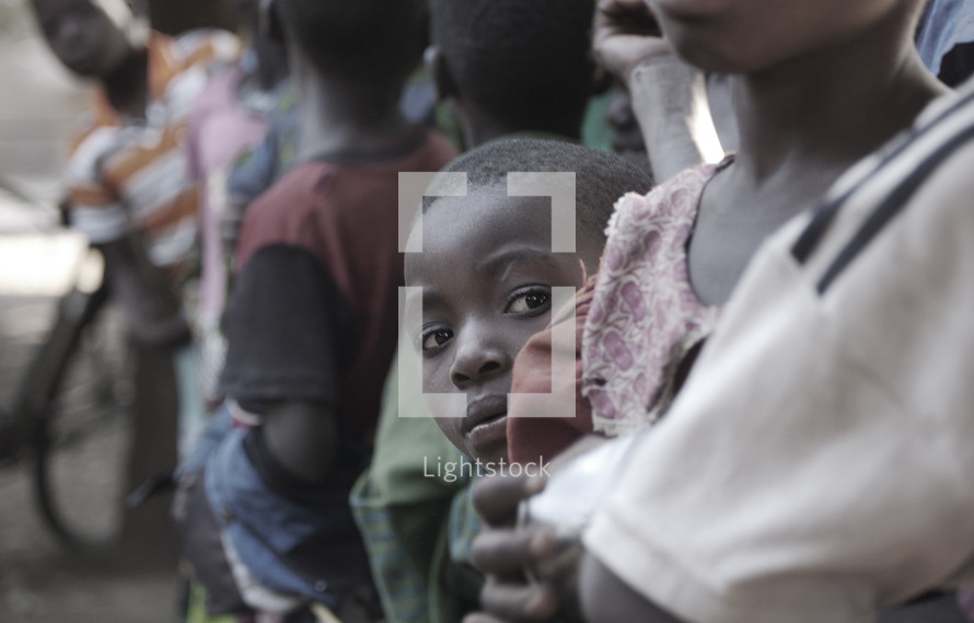 children in a crowd in Africa 