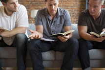 men's group Bible study discussing scripture 
