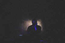 fog machine, man, on stage, microphone, DJ, Disc Jockey, club