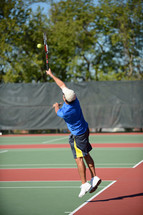 man playing tennis 