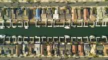 aerial view over homes along a canal in California 