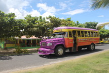 colorful tourbus on an island 