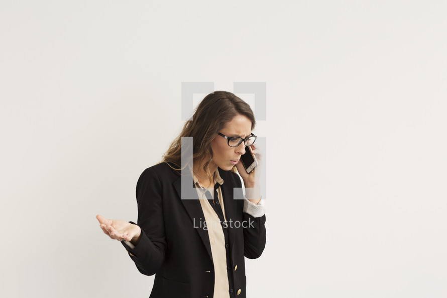 a young woman arguing on a cellphone 
