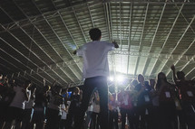youth in song at a concert 