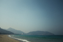 beach and mountainous coastline 