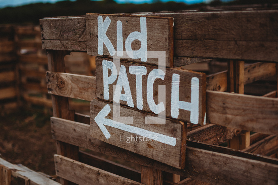 Kid patch sign at a pumpkin patch 