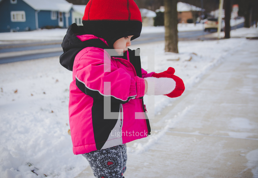 toddler girl in the snow 