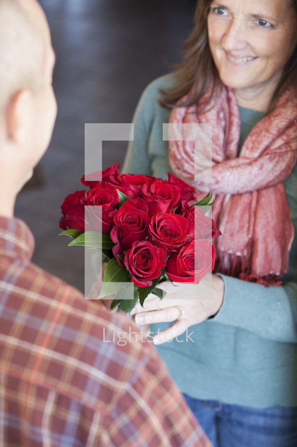 woman receiving flowers