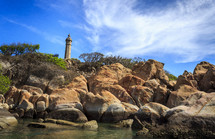 lighthouse and rocks 