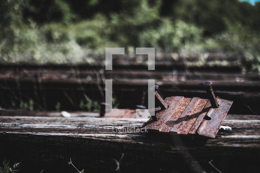old train tracks and rusty nail spikes 