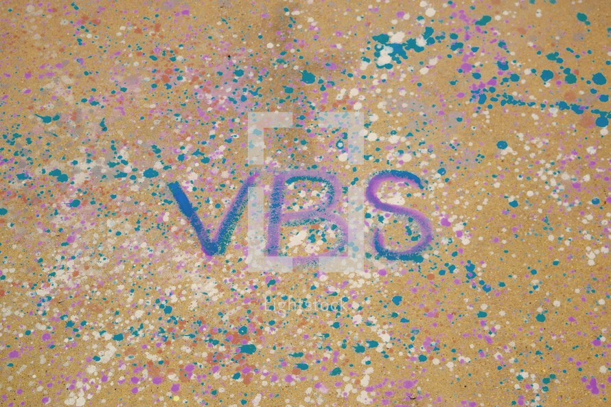 letters VBS on paint splatter 