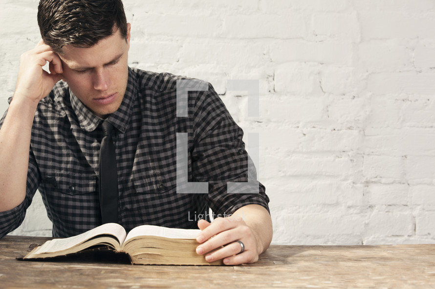 A man reading a Bible 