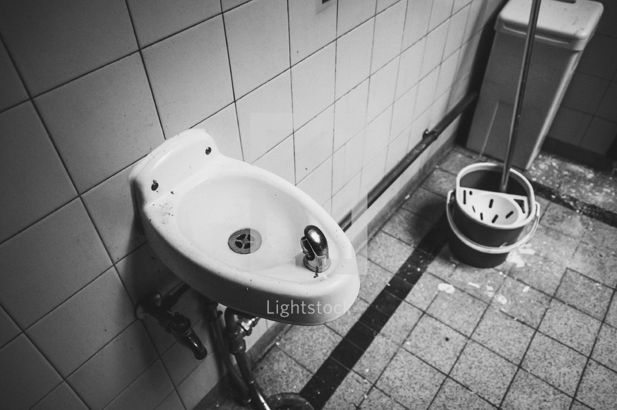 drinking fountain and mop bucket 