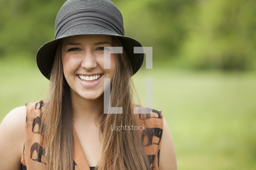 portriat of smiling young brunette girl