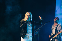 performers on stage at a youth rally 
