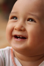 a face of an Asian toddler