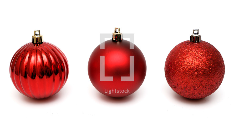 red ornaments on a white background 