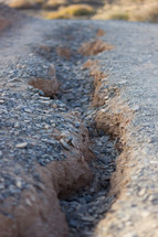 crack on a gravel road 