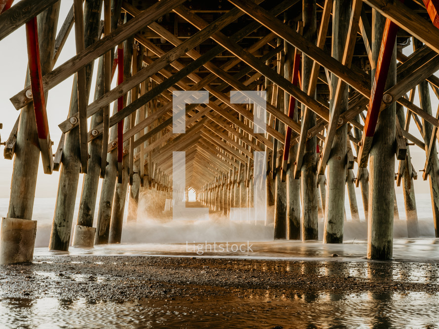 waves under a pier 