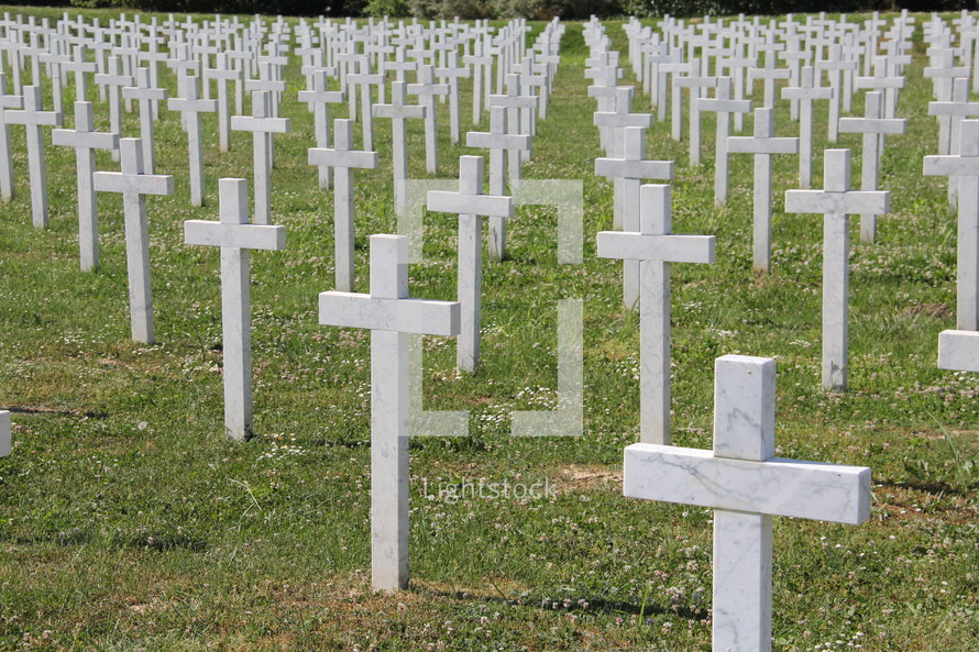 Simple cross grave markers in a war grave yard
