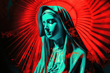 Portrait of a statue of the Mother Mary in red light.