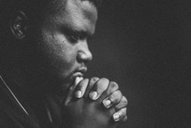 African American man in prayer 