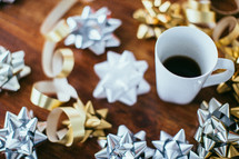 Christmas bows and coffee mug