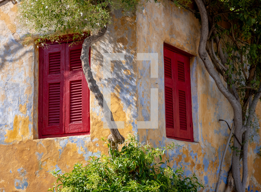 red shutters on windows 