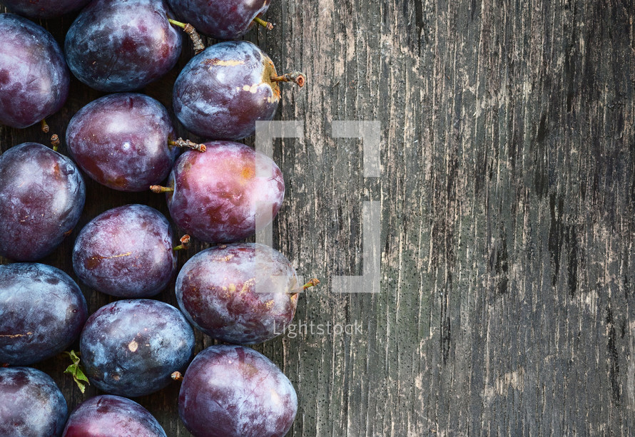 plums on wood 