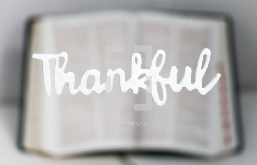 word thankful over an open Bible 