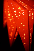 A shining red paper star lantern.