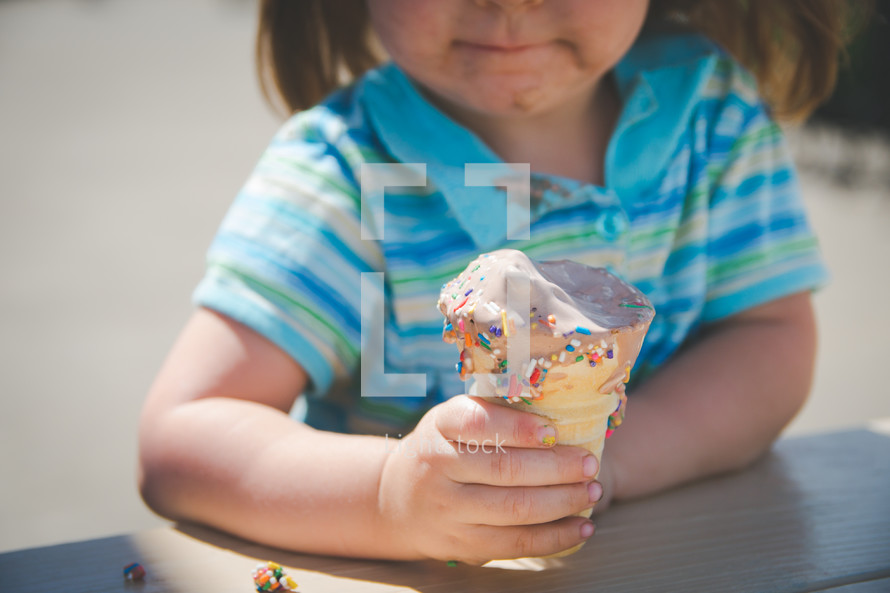 a girl eating ice cream 