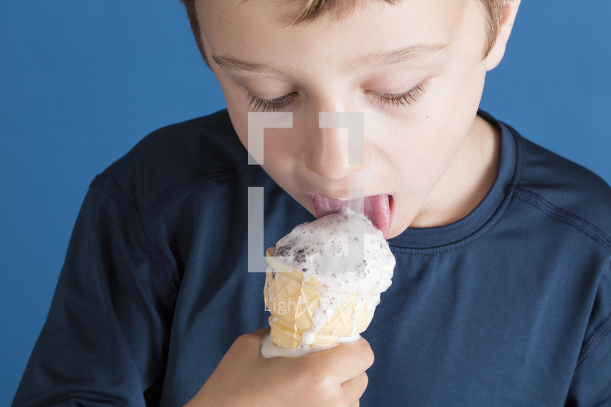 kid eating ice cream cone 