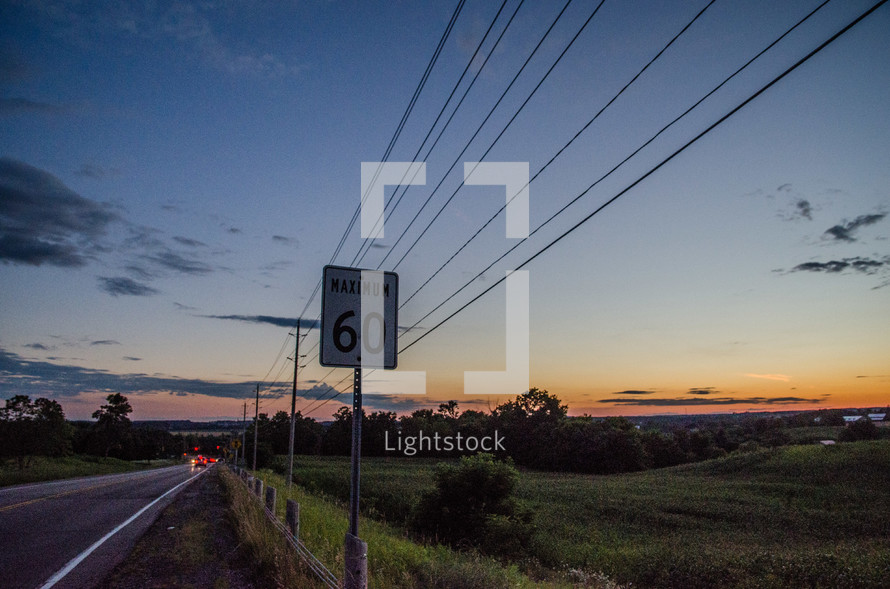 highway, speed limit sign, and powerless at sunset 