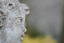 Sculpture of the face of a child.