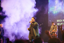 performers on stage at a youth rally 