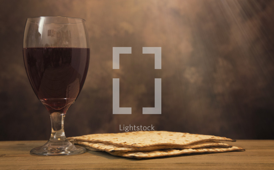 communion wine glass, unleavened bread 