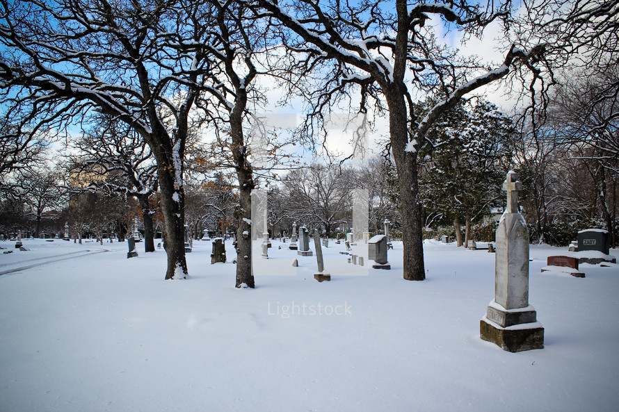 snow covered cemetery