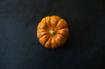 mini pumpkin in the center 